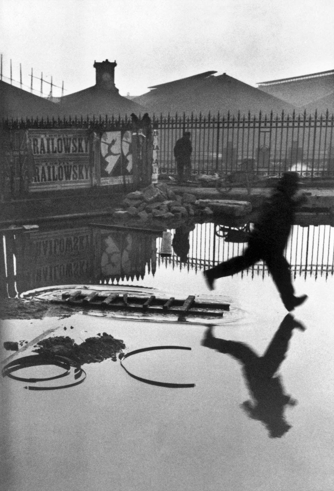 Henri+Cartier-Bresson+-+Behind+Saint-Lazare+Train+Station,+1932.jpg